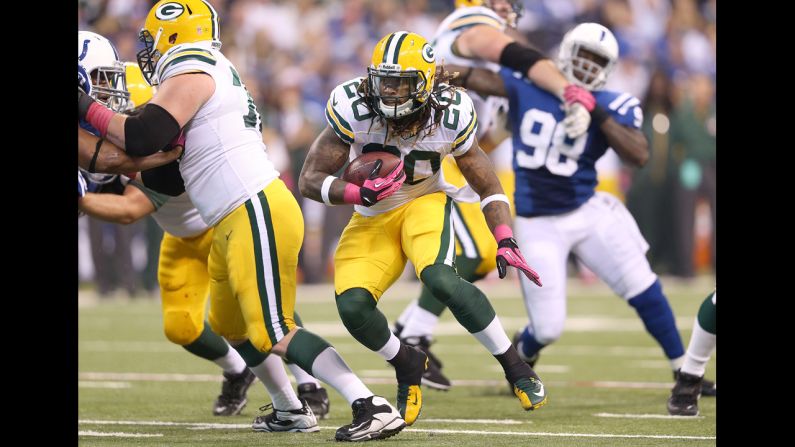 Alex Green of the Packers runs the ball Sunday against the Colts.