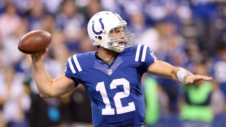 Colts quarterback Andrew Luck fires a pass Sunday.