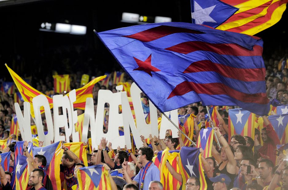Barcelona fans hold letters forming the word 'Independencia' and wave Catalan 'Estelada' independence flags in the match against Real Madrid. 