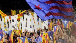 Barcelona fans hold letters forming the word 'Independencia' and wave Catalan 'Estelada' independence flags in the match against Real Madrid. 