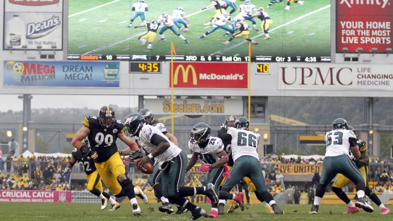 Quarterback Michael Vick of the Philadelphia Eagles rolls out during the game against the Pittsburgh Steelers on Sunday at Heinz Field in Pittsburgh.