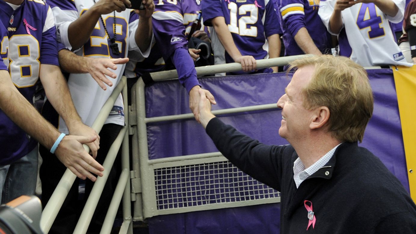 NFL Commissioner Roger Goodell greets fans before Sunday's Vikings-Titans game in Minneapolis.