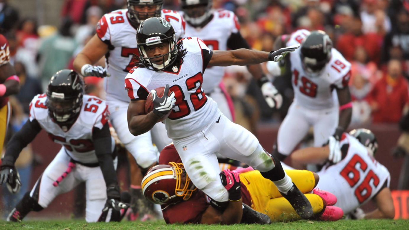 Michael Turner of the Atlanta Falcons runs the ball against the Washington Redskins on Sunday at FedEx Field in Landover, Maryland.