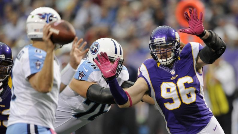Brian Robison of the Minnesota Vikings puts pressure on Tennessee Titans quarterback Matt Hasselbeck on Sunday at the Hubert H. Humphrey Metrodome in Minneapolis.
