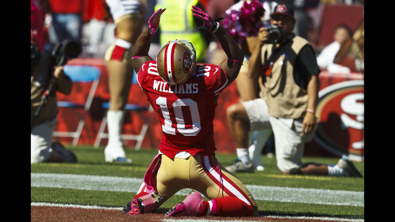 Ther 49ers' Kyle Williams celebrates his touchdown against the Bills on Sunday.