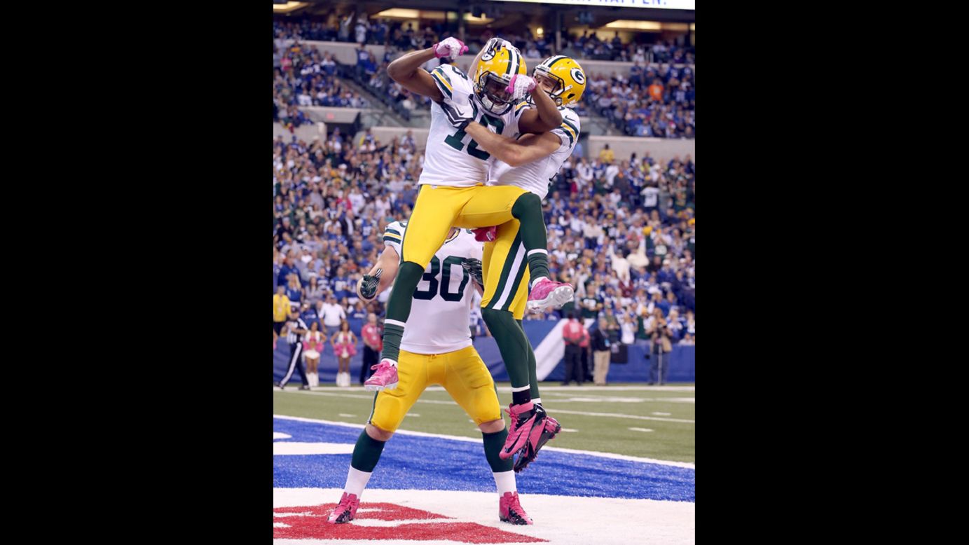 No. 18 Randall Cobb of the Green Bay Packers celebrates after scoring a touchdown Sunday against the Indianapolis Colts.