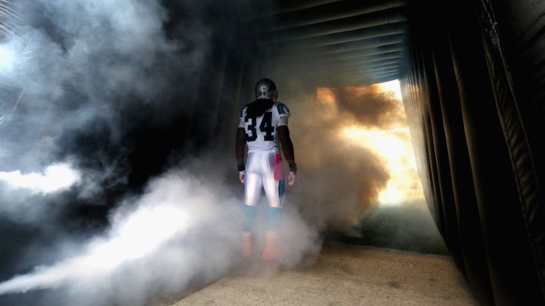 DeAngelo Williams of the Panthers waits to be introduced on Sunday in Charlotte.