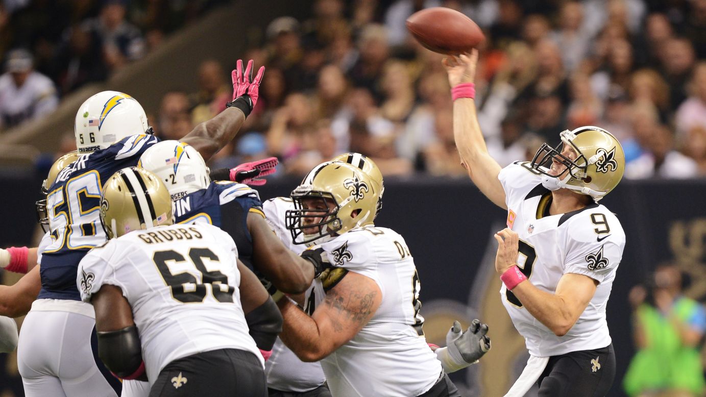 Quarterback Drew Brees of the New Orleans Saints throws a pass in the first quarter against the San Diego Chargers.