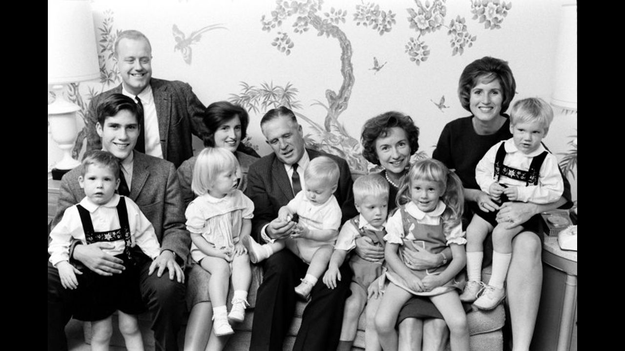 A 16-year-old Mitt Romney, left, in a family portrait in November 1963. His father, George, and his mother, Lenore, are seated at center.