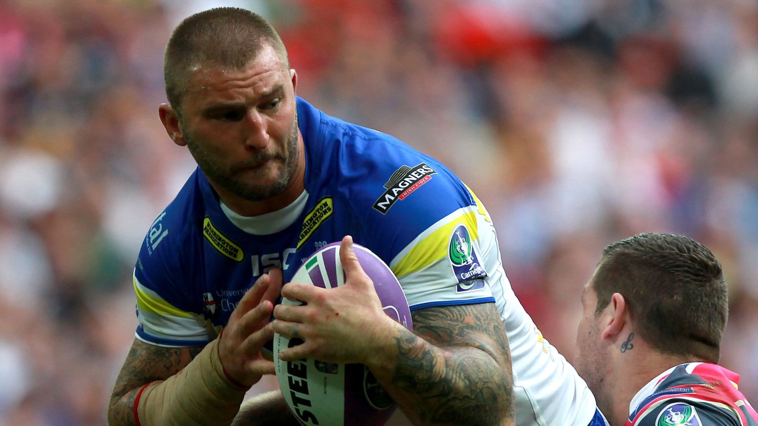 Warrington Wolves player Paul Wood played on despite rupturing a testicle.