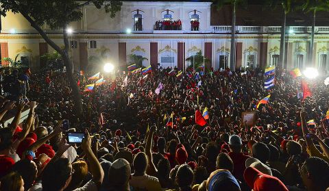 The Venezuelan leader addresses supporters Sunday night in Caracas. Fireworks peppered the sky over the capital soon after the provisional results were announced.