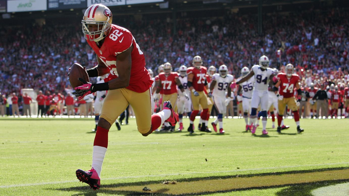Mario Manningham of the San Francisco 49ers pulls off a touchdown against the Buffalo Bills in the fourth quarter on Sunday at Candlestick Park in San Francisco. Check out the action so far from Week Five of the NFL, or <a href="http://www/2012/09/27/worldsport/gallery/nfl-week-4/index.html" target="_blank" target="_blank"><strong>look back at the best from Week Four</strong></a>.