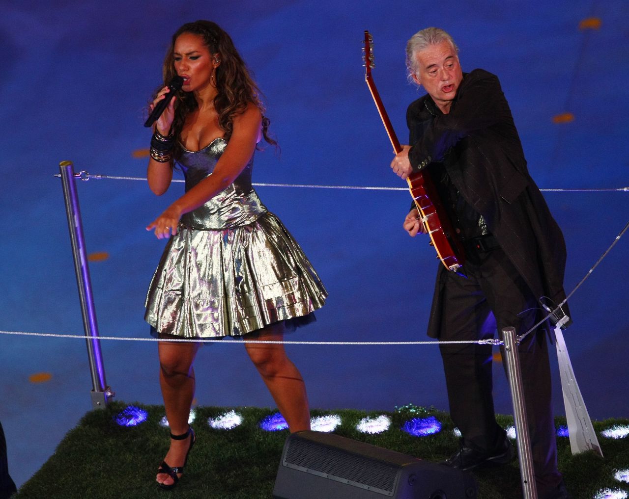 Leona Lewis performs with Page during the closing ceremony of the Beijing 2008 Olympics.