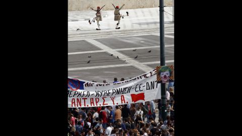 Protesters gather in front of the Greek Parliament in Syntagma Square.