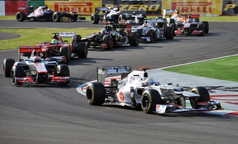 Kobayashi leads a group during Sunday's Grand Prix at the famous Suzuka circuit. 