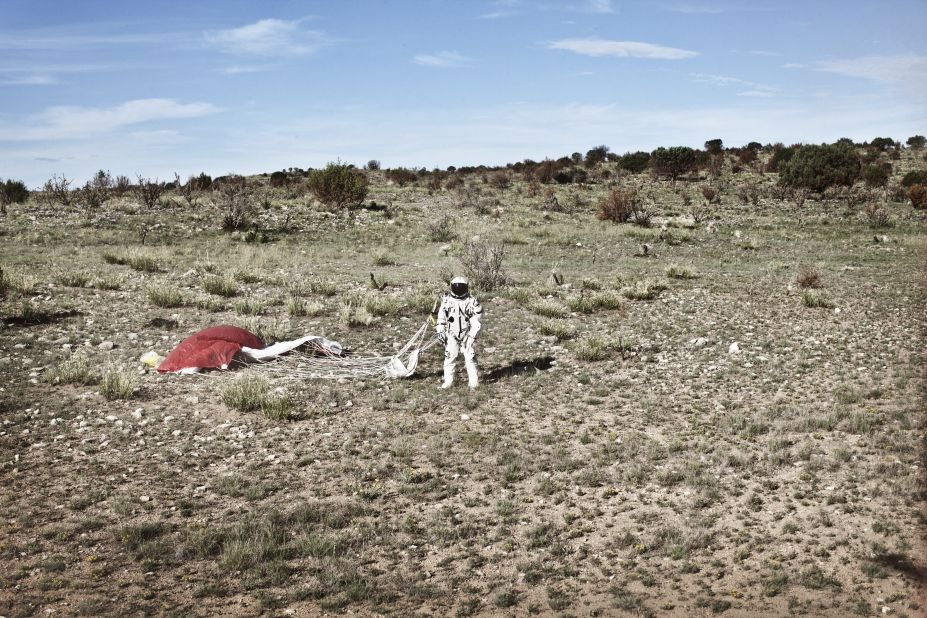 Baumgartner stands in the desert after completing the second manned test flight for Red Bull Stratos in Roswell, New Mexico, on July 25. 