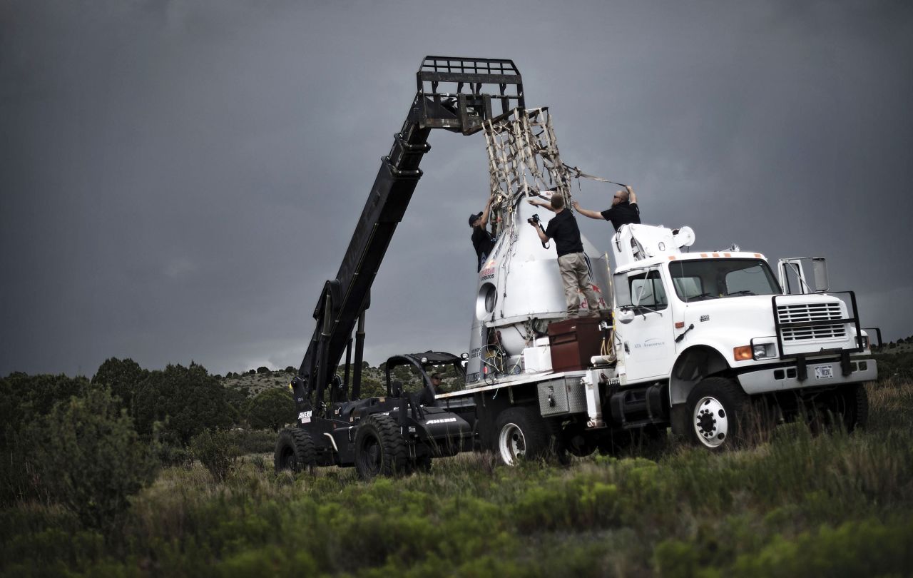 Crew members recover the capsule after the second manned test flight for Red Bull Stratos in Roswell on July 25.