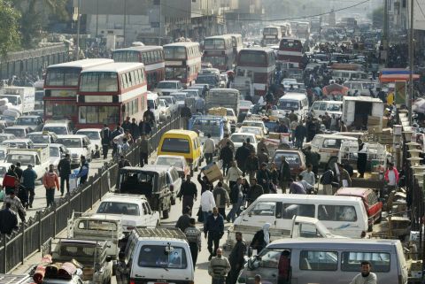 Cars choke traffic-clogged Baghdad streets, which are pinched every few miles by military checkpoints.