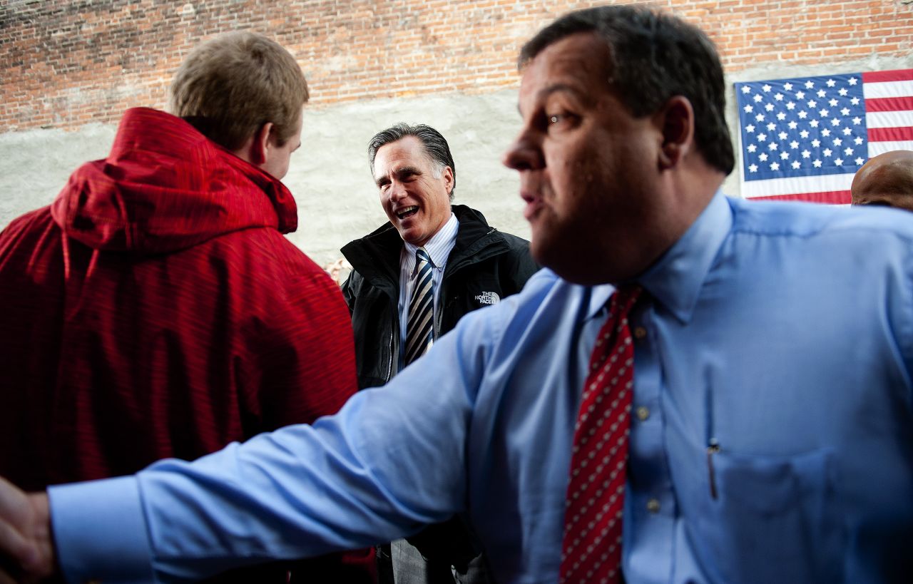 Romney and New Jersey Gov. Chris Christie talk with supporters at Buns Bakery and Restaurant in Delaware, Ohio, on Wednesday, October 10. Romney is campaigning in Ohio with less than a month to go before the general election.