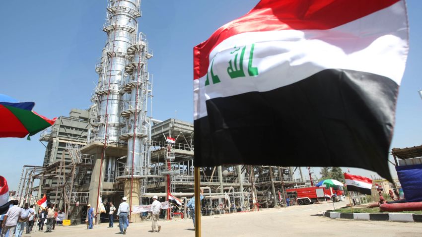 The Iraqi flag flutters during the official opening of the second refinery for crude oil in Al-Dora refinery complex in Baghdad on September 16, 2010. 