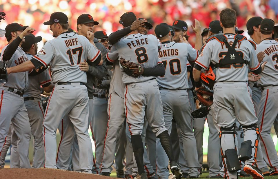 The San Francisco Giants celebrate their 6-4 win Thursday over the Cincinnati Reds. The Giants won the National League Division Series three games to two. 