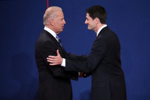 Vice President Joe Biden, left, shakes hands with Republican vice presidential candidate Paul Ryan before the vice presidential debate.