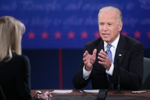 Vice President Joe Biden speaks during the vice presidential debate as moderator Martha Raddatz looks on.