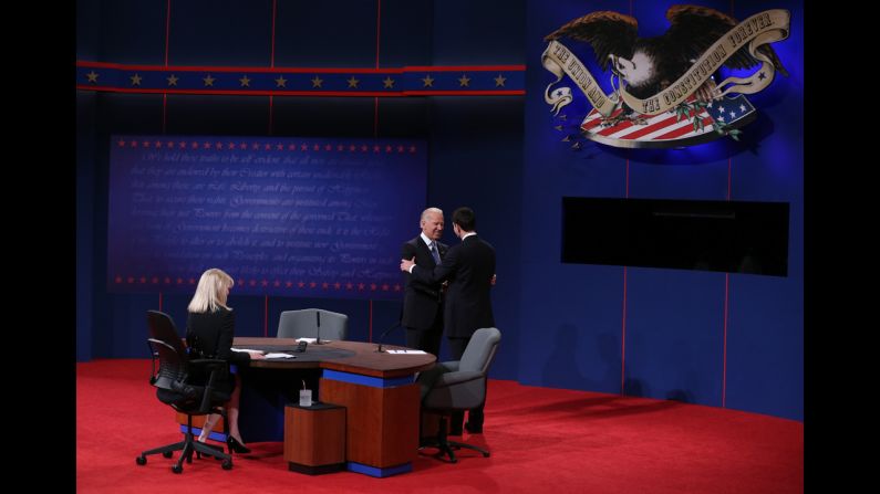 Vice President Biden greets Republican vice presidential candidate Paul Ryan as they take the stage.