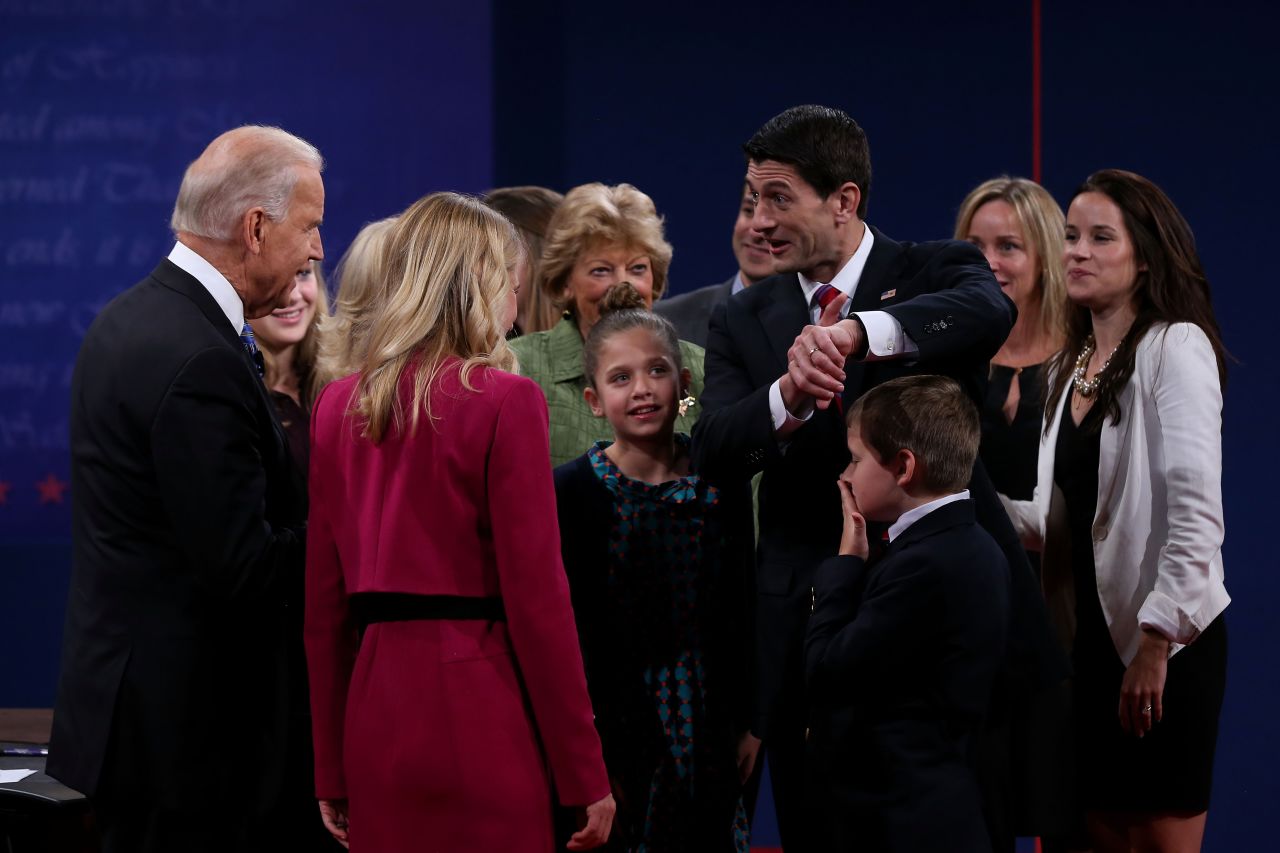 Vice President Joe Biden and Rep. Paul Ryan mingle with their families after the debate.