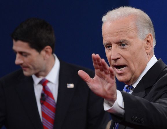 U.S. Vice President Joe Biden, right, and Republican vice presidential candidate Paul Ryan depart the stage following their debate on Thursday, October 11. <a href="index.php?page=&url=http%3A%2F%2Fwww.cnn.com%2F2012%2F10%2F11%2Fpolitics%2Fgallery%2Fjoe-biden-expressions%2Findex.html" target="_blank">See the many expressions of Vice President Joe Biden during the debate</a>.