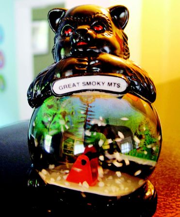 The "I Swallowed a Snow Globe" bear with demon eyes.