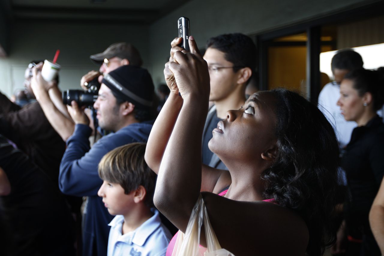 Spectators crowd for a view of Endeavour as it passes through Los Angeles on Friday.