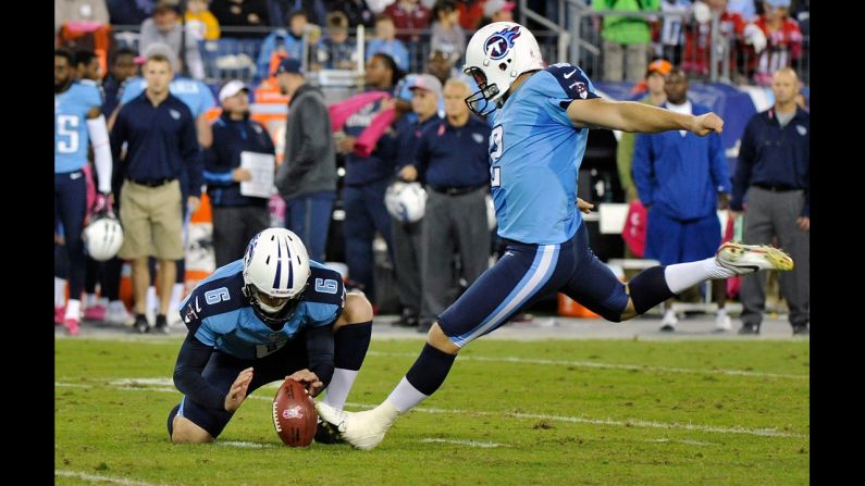 Brett Kern of the Tennessee Titans holds the ball during a field goal attempt by teammate kicker Rob Bironas on Thursday. 