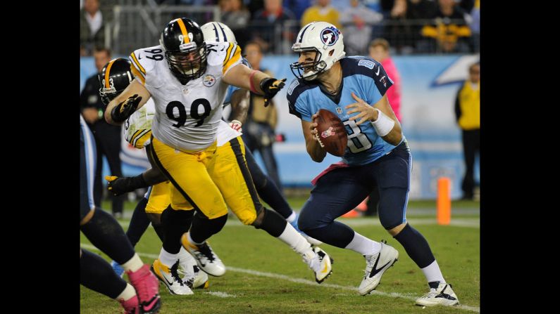 Defensive End Brett Keisel, No. 99 of the Pittsburgh Steelers, pressures Titans quarterback Matt Hasselbeck.