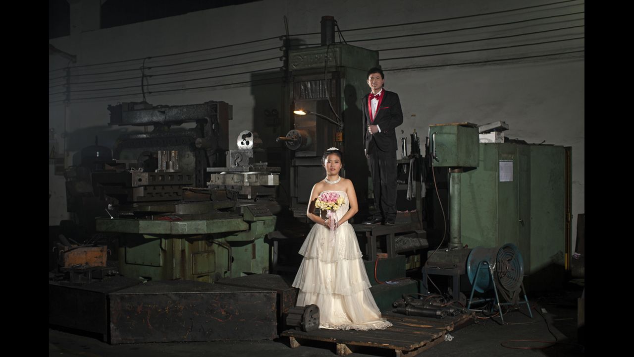 "Love on the Assembly Line" by Jia Dai Teng Fei of China. "A wedding photo set in beautiful scenery, with a lovely blue sky, is the dream of many young couples. But such portraits are expensive in China, and beyond the reach of large numbers of workers who come from rural areas to seek their fortunes in cities. The photographer decided to give a few of them the opportunity of a different sort of wedding picture - set against the backdrop of their workplace," the press release stated. 