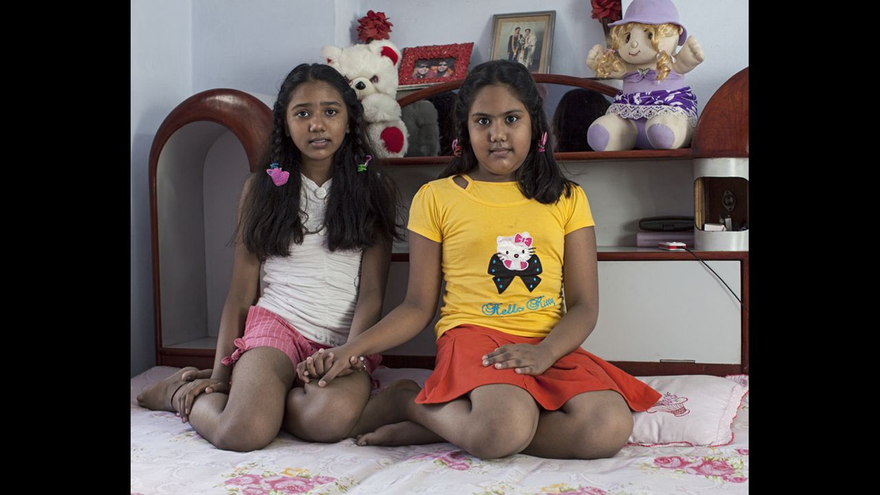 "Strangers" by Indian photographer Dhruv Malhotra. "Increasing urban migration in India has led to fundamental changes in old ways of life. People often no longer know their neighbors. The photographer knocked on the doors of complete strangers in Jaipur, and asked to photograph them. Building an immediate trusting relationship was essential to this process, but the photographer pushed his own boundaries, too, as intimate portrait photography was a new direction for him," according to the press release.
