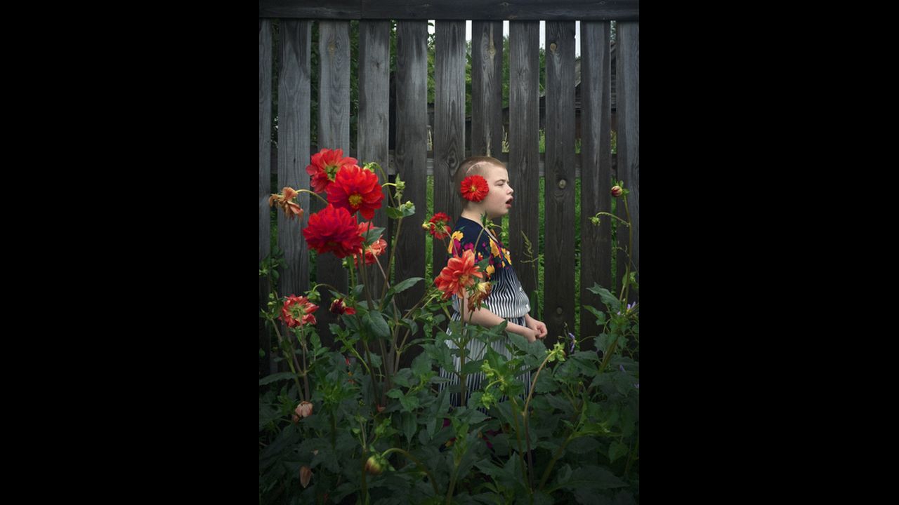 "Elatma" by Russian photographer Anastasia Rudenko. "Elatma is a small town, some 300 kilometers east of Moscow, that is home to six institutions for the mentally disabled. The photographer wanted to portray the everyday lives of the mentally disabled people there, and to explore the degree of trust she could build up with them. Getting access was difficult, and in the end she was permitted to work in only two of the institutions," according to the press release.