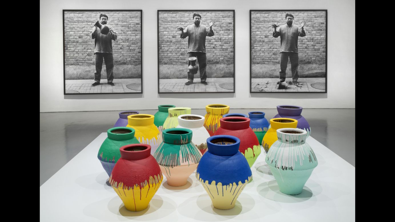 "Dropping a Han Dynasty Urn" (1995/2009), top, is a photographic triptych that confronts the power of ancient symbols, according to the museum, while "Colored Vases" (2007-2010) seeks to replace those symbols with new works.