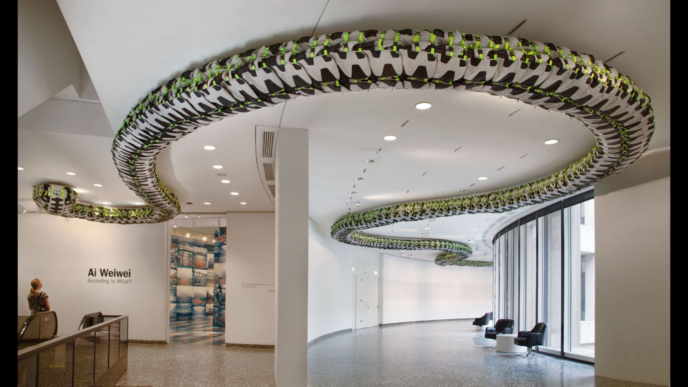 "Snake Ceiling" (2009) uses hundreds of backpacks to represent children's backpacks left behind after the 2008 Sichuan earthquake.