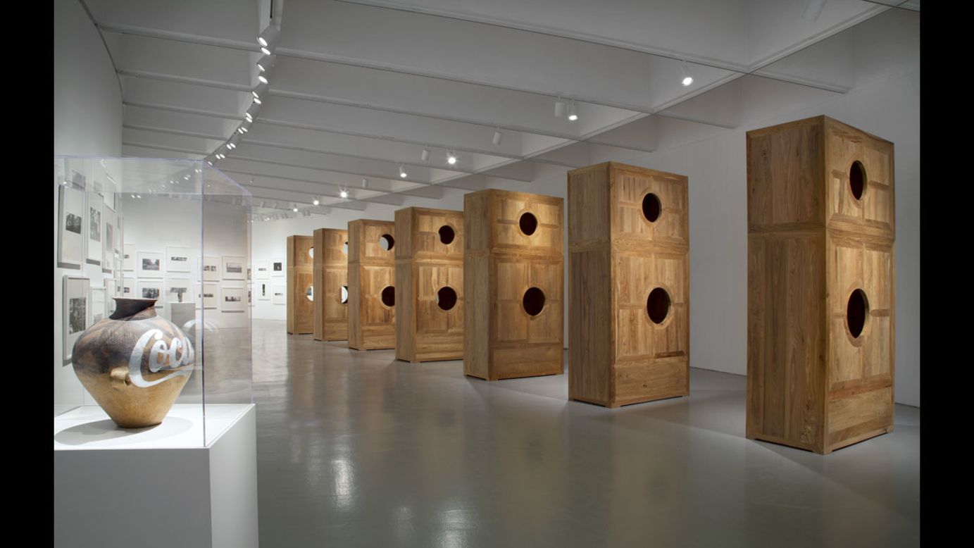 "Coca-Cola Vase" (2007), left, is a product of a new aesthetic, meant to replace older or outdated works, according to the museum. "Moon Chest" (2008) is at right.