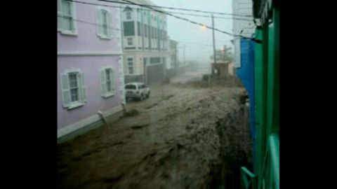 College Street, which  runs through the middle of Basseterre, is filled with floodwaters.