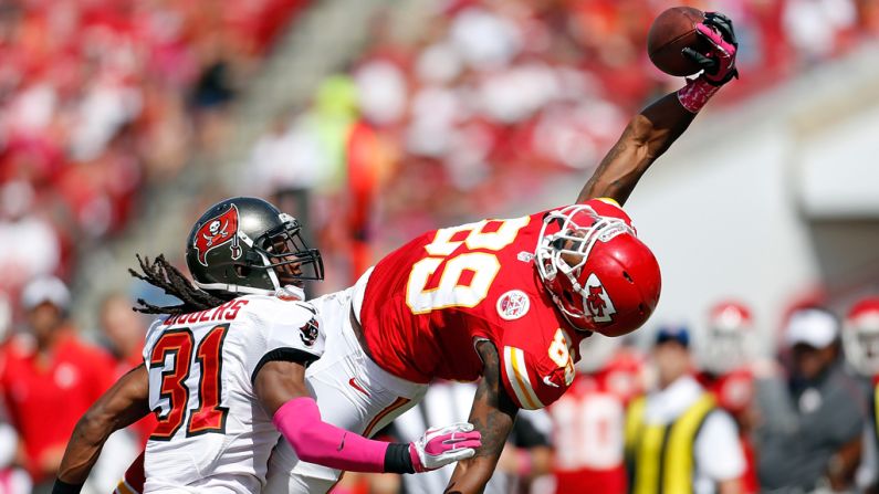 Jon Baldwin of the Kansas City Chiefs tries to make a catch against defender E.J. Biggers of the Tampa Bay Buccaneers on Sunday at Raymond James Stadium in Tampa, Florida.