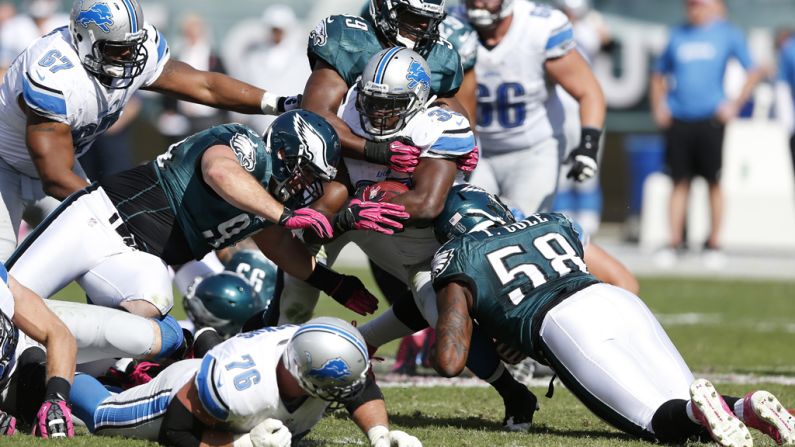 Joique Bell of the Detroit Lions is tackled during Sunday's game against the Philadelphia Eagles at Lincoln Financial Field in Philadelphia.