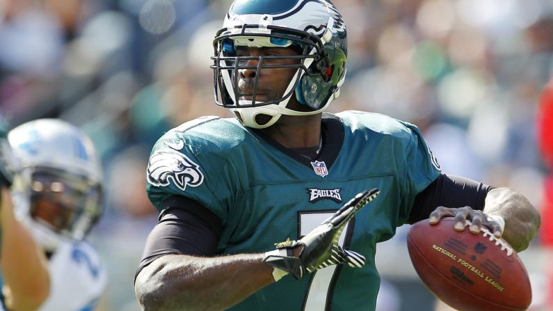 Eagles quarterback Michael Vick looks to pass against the Lions.