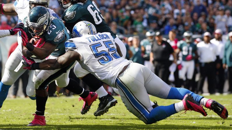 LeSean McCoy of Philadelphia is tackled in the end zone by Stephen Tulloch of Detroit.