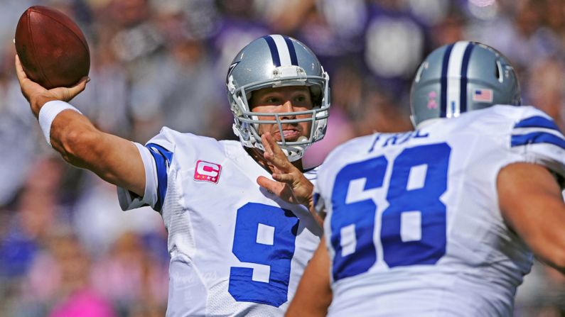 Cowboys quarterback Tony Romo throws a pass during Sunday's game against the Ravens.