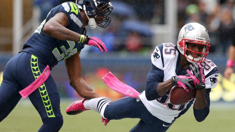 Brandon Lloyd of the New England Patriots makes a catch against Brandon Browner of the Seattle Seahawks.