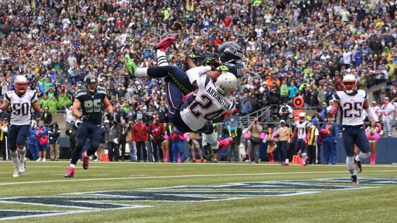 Doug Baldwin of the Seattle Seahawks makes a touchdown reception against Kyle Arrington of the New England Patriots on Sunday.