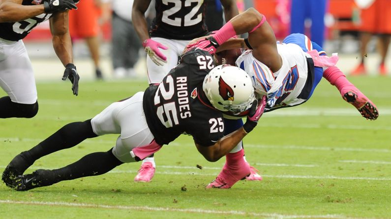 Kerry Rhodes of the Arizona Cardinals tackles Fred Jackson of the Buffalo Bills.