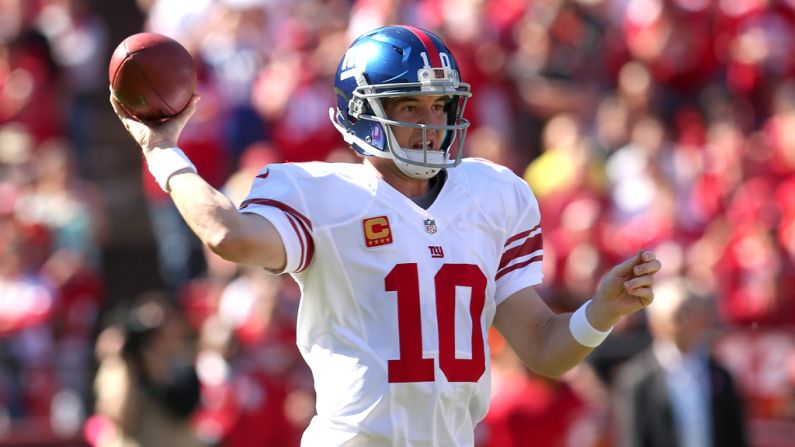 Quarterback Eli Manning of the New York Giants throws a pass against the San Francisco 49ers.